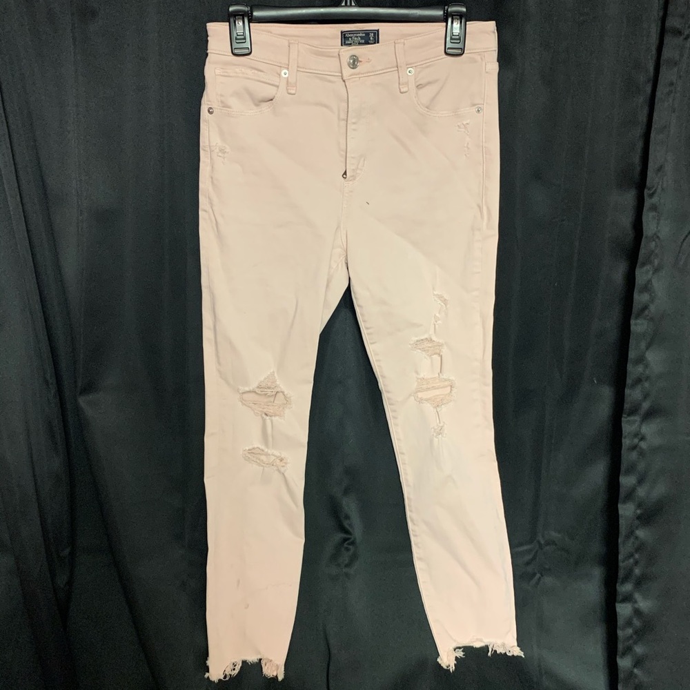 Light pink distressed denim